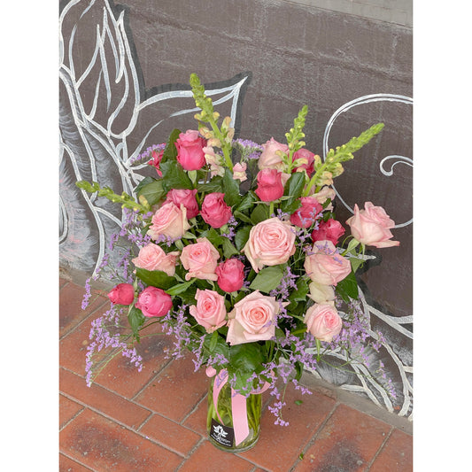 Spoil mum pink blooms in vase